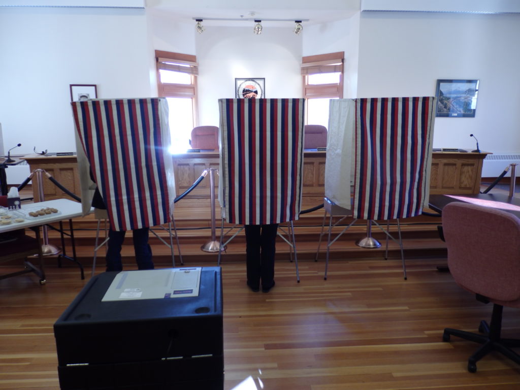 Skagway residents cast votes in the 2015 municipal election. (Emily Files)