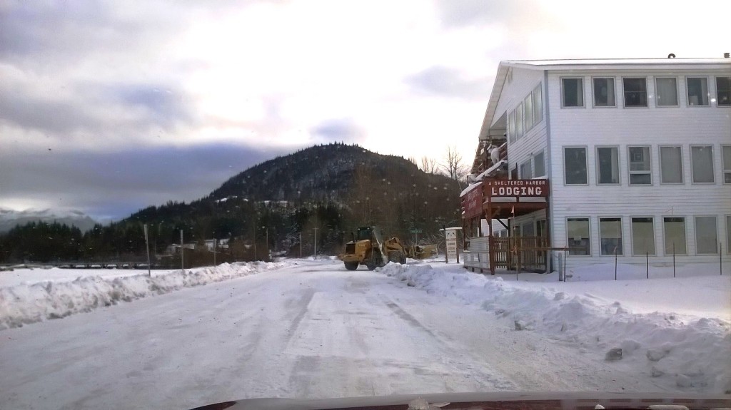 A plow turns off the highway in Haines Tuesday. (Emily Files)