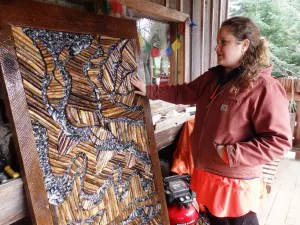Megan Morehouse with her mosaic for the Fort Seward Outdoor Art Project. (Emily Files)