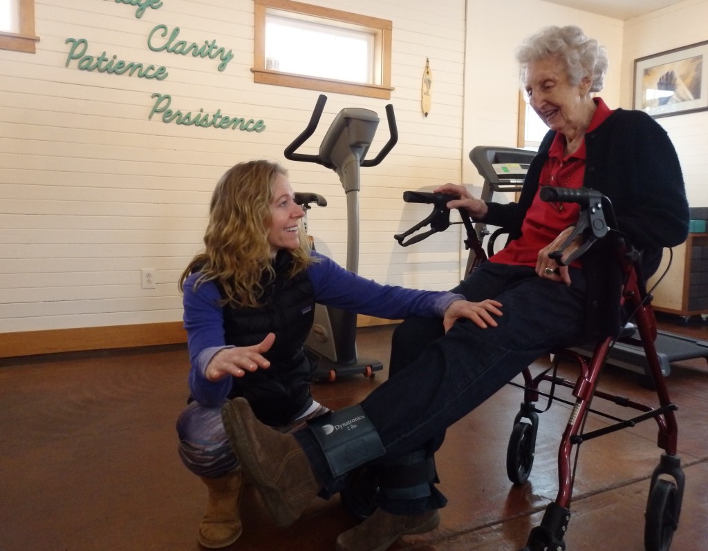 Physical therapist Marnie Hartman works with 92-year-old patient Marge Ward. Hartman says most of her business comes from people 65 and older. (Emily Files)