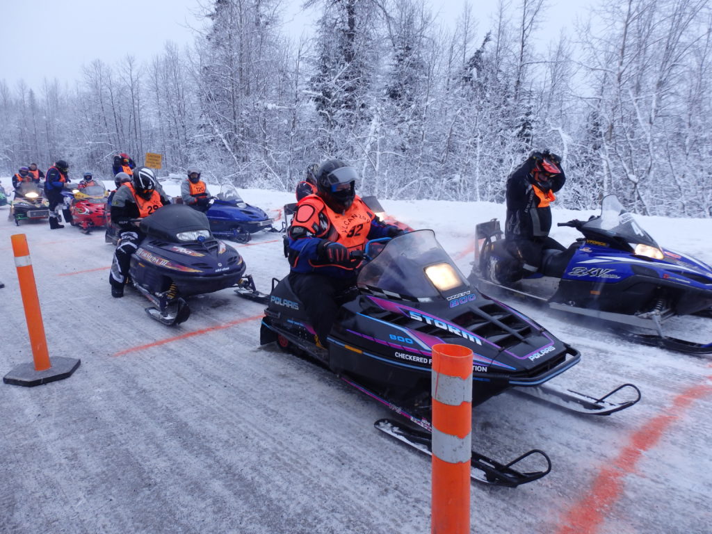 Riders wait for the start of the Alcan 200 in January 2016. (Emily Files)