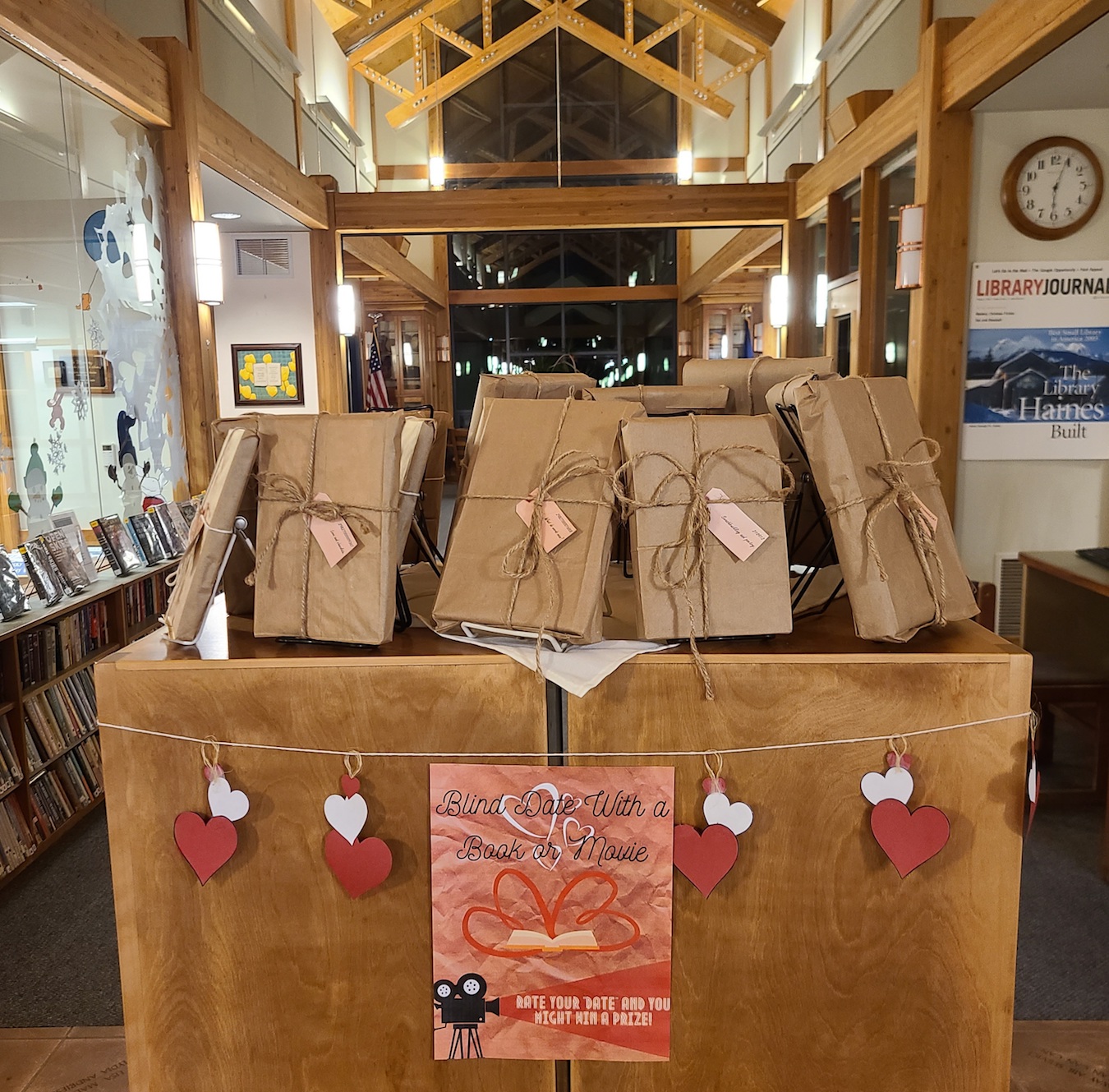 books wrapped in brown paper with hearts